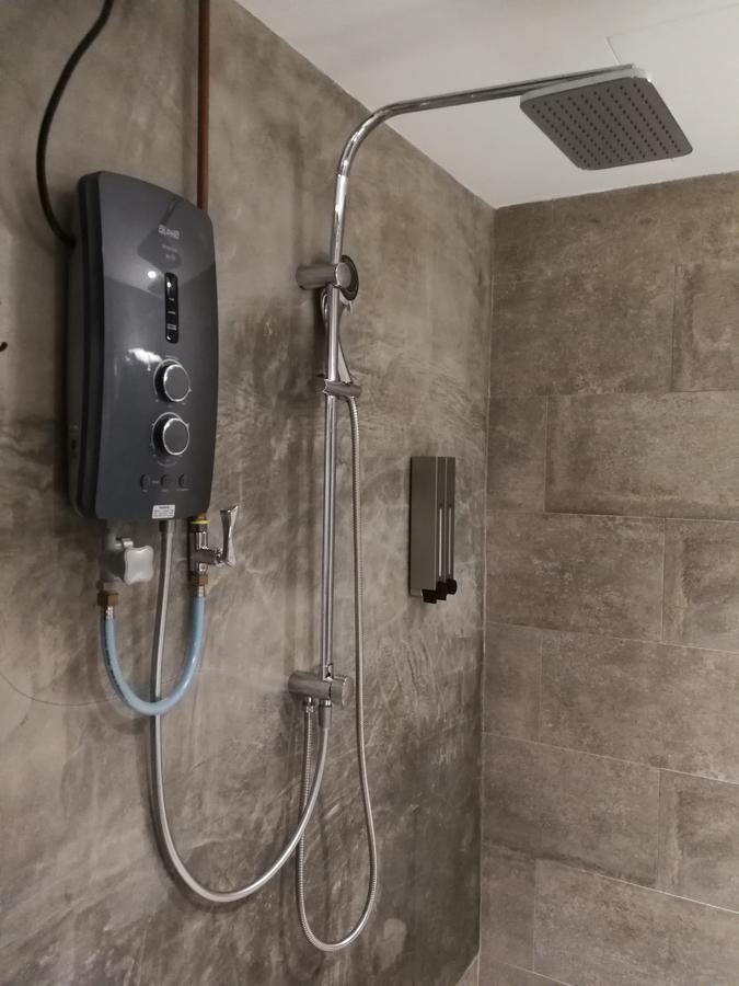 The Rise Room Kuala Terengganu Exterior photo A shower with a shower heater
